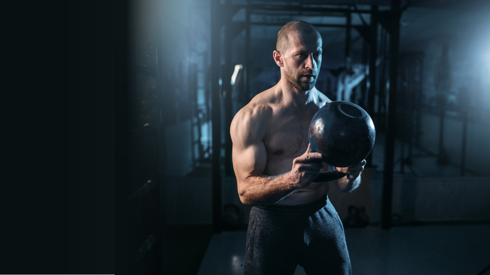An athlete working out with a kettlebell while using Ethica Energy + Focus™ - Nootropic Pre-Workout