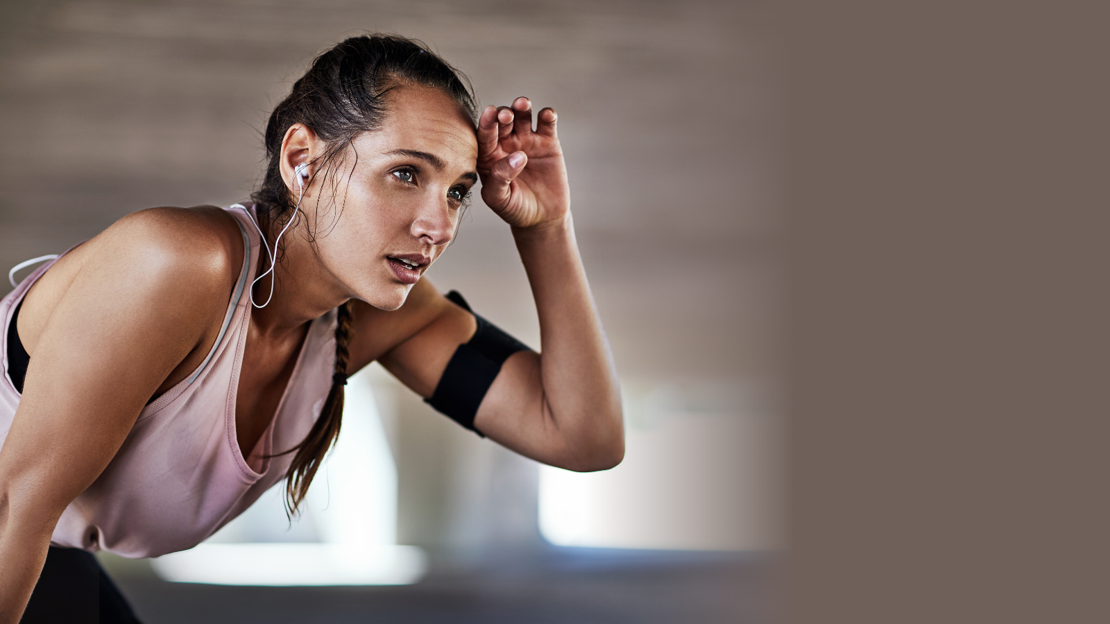 A female athlete in need of recovery hydration & electrolytes